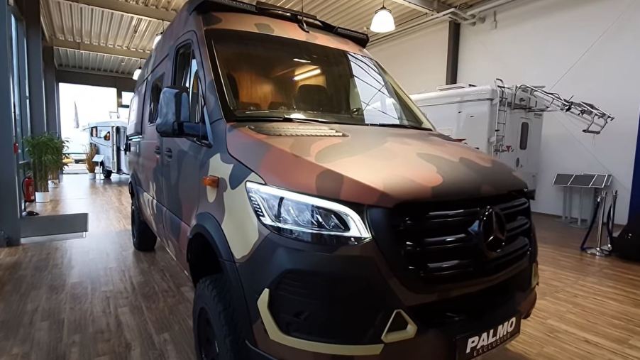 A camouflaged 2021 Hymer Grand Canyon RSX offroad RV