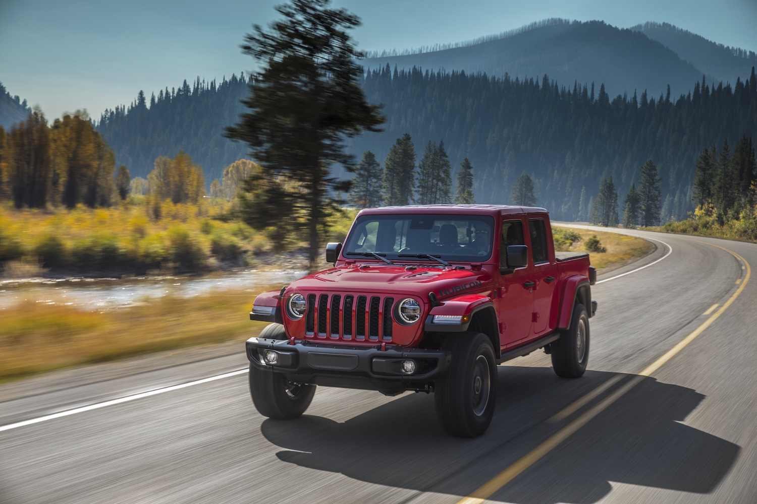 2021 Jeep Gladiator driving through the mountains