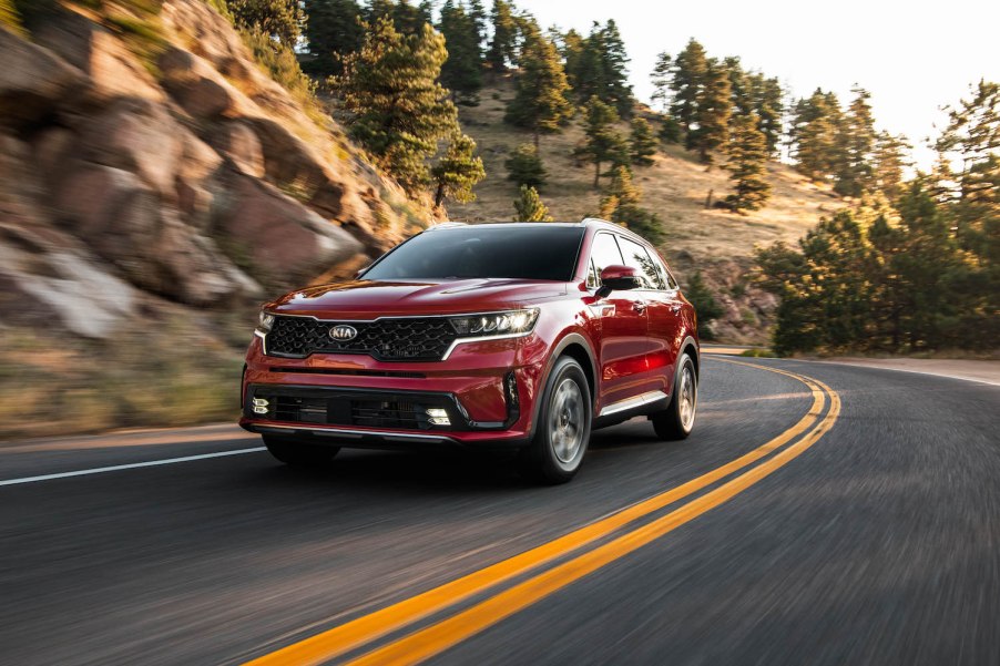 2021 Kia Sorento Hybrid driving around a bend