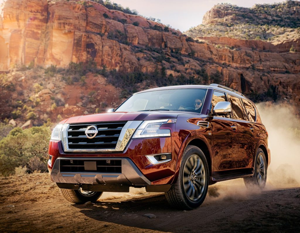 A red 2021 Nissan Armada off-road.