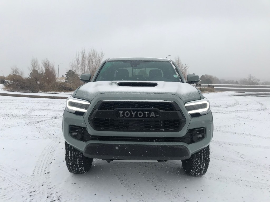 Front grille view of a 2021 Toyota Tacoma TRD Pro in the snow
