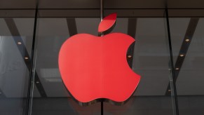 A red Apple logo on the Apple Store on Nanjing Road Pedestrian Street in Shanghai, China, on December 1, 2020.