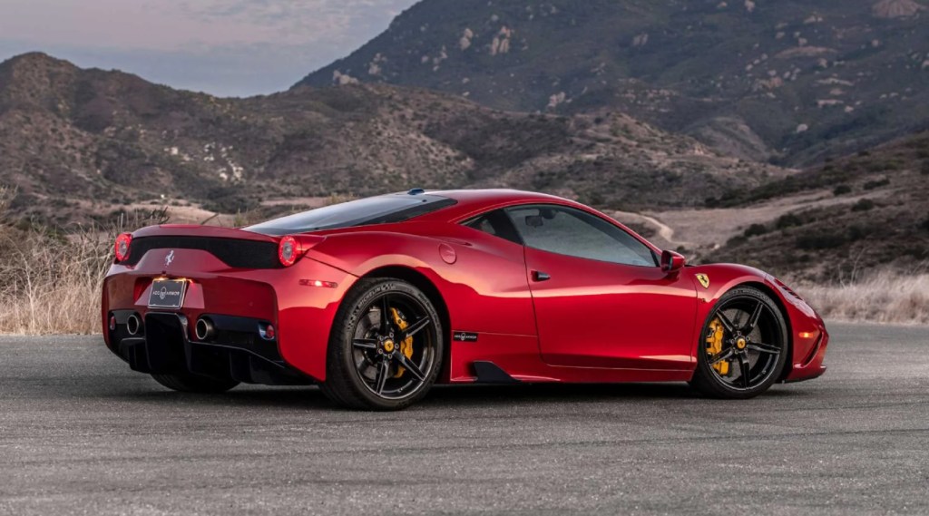 The rear 3/4 view of an armored red Ferrari 458 Speciale