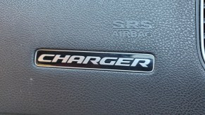 A close-up shot of a Dodge Charger steering wheel