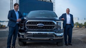 Ford CEO Jim Farley, left, and Executive Chairman of Ford Bill Ford pose for a photo with the 2021 Ford F-150 King Ranch Truck