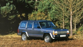 A first-generation Jeep Cherokee in the woods