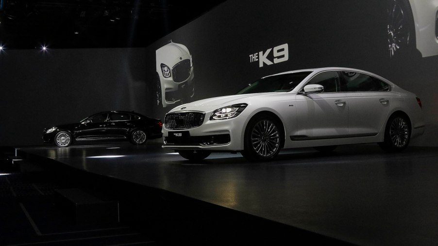 Kia Motor Company New Sedan Vehicle The K9 displayed on the show stage during an Unveil Event at Hotel's Grand Ballroom in Seoul, South Korea. the K9 will be available with two V6 engine choices and a V8, but the K900 in the U.S. will only get the 3.3-liter biturbo V6 from the Stinger