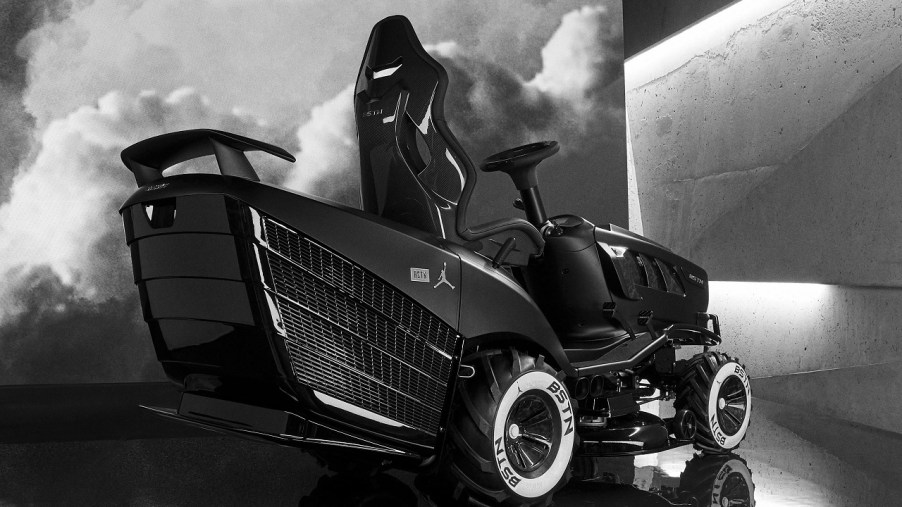 The rear 3/4 view of the black Mansory BSTN GT XI mower