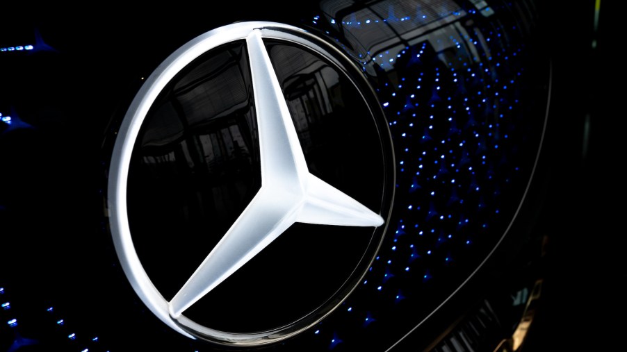 The Mercedes-Benz logo on the grille of the electric vehicle Mercedes Vision EQS