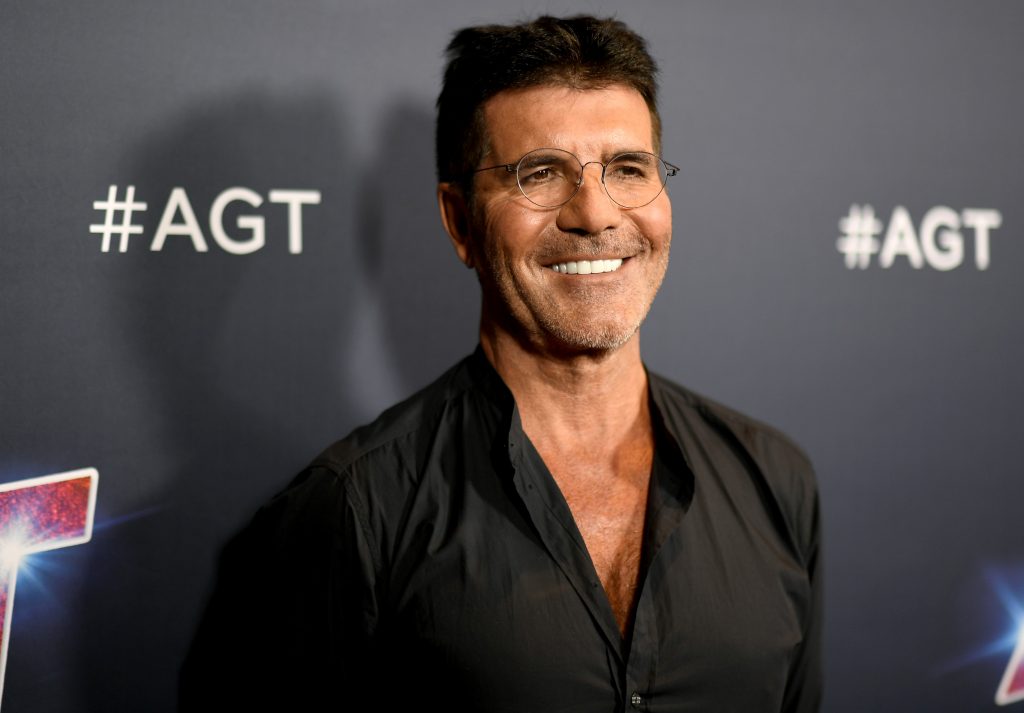 Simon Cowell smiles for a photo opportunity.