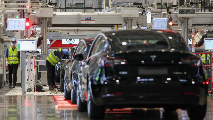 Employees work at the Tesla Gigafactory in Shanghai, east China, Nov. 20, 2020. U.S. electric car company Tesla