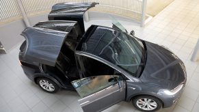 A Tesla Model X is on display in the new Tesla Service Center