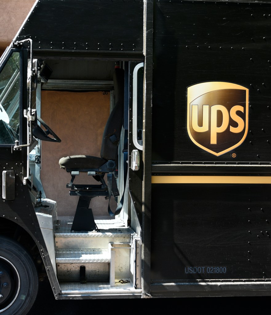 A UPS (United Parcel Service) truck makes a delivery in Santa Fe, New Mexico | Robert Alexander/Getty Images