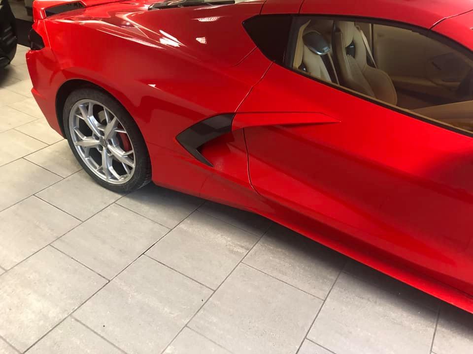 An image of a Chevy Corvette C8 at a dealership.