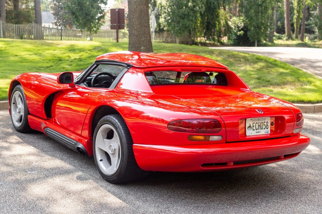 The rear 3/4 view of a red 1993 Dodge Viper RT/10 with a hardtop