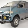 A turquoise 1994 Mitsubishi Delica Space Gear LWB 4x4