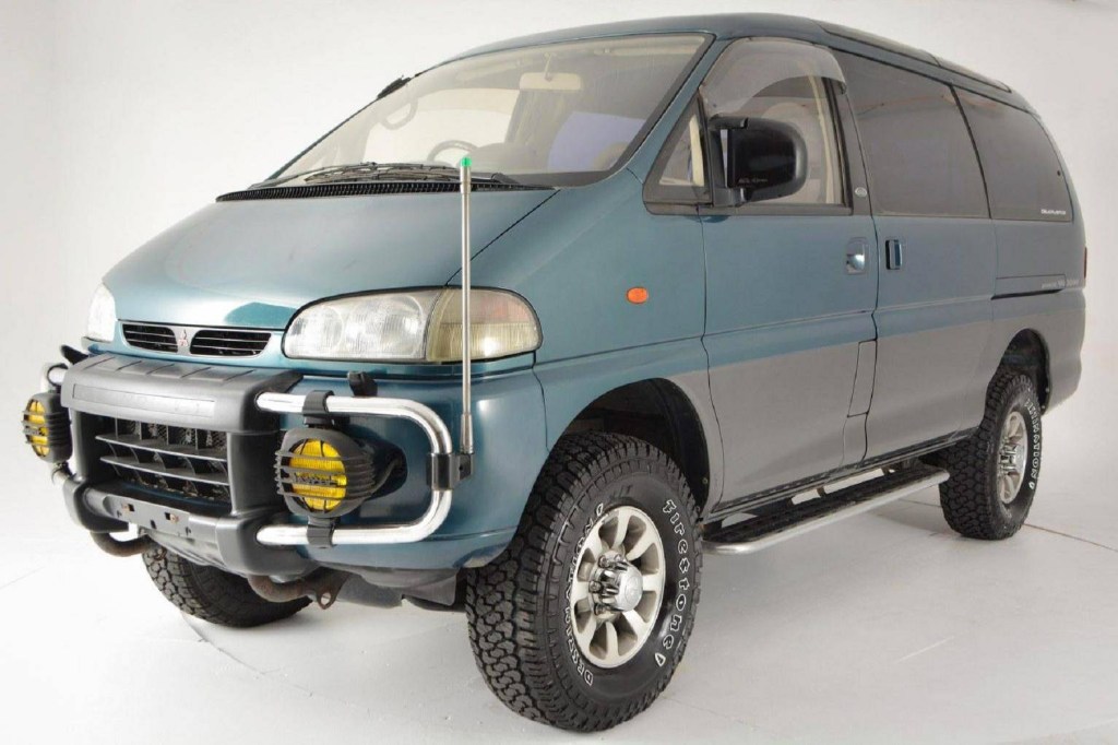 A turquoise 1994 Mitsubishi Delica Space Gear LWB 4x4