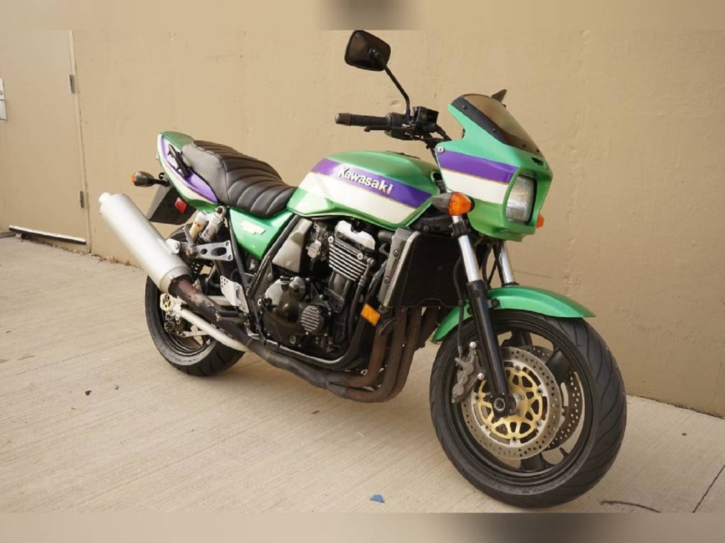 A green-white-and-purple 2000 Kawasaki ZRX1100