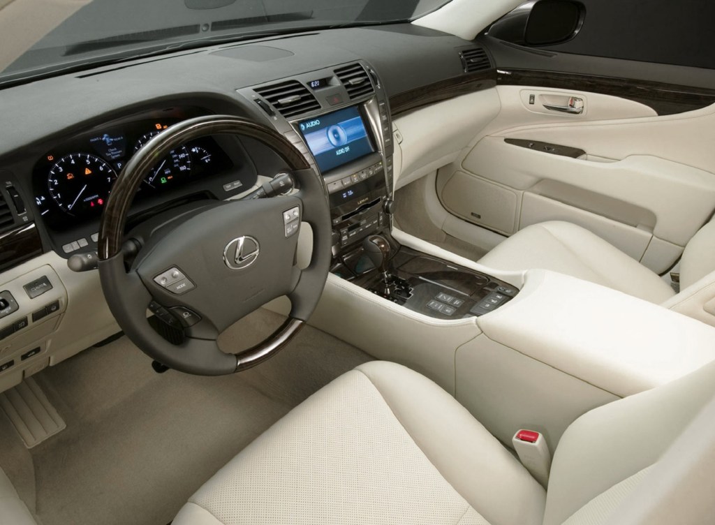 The tan-leather front seats and wood-trimmed dashboard of the 2009 Lexus LS 460