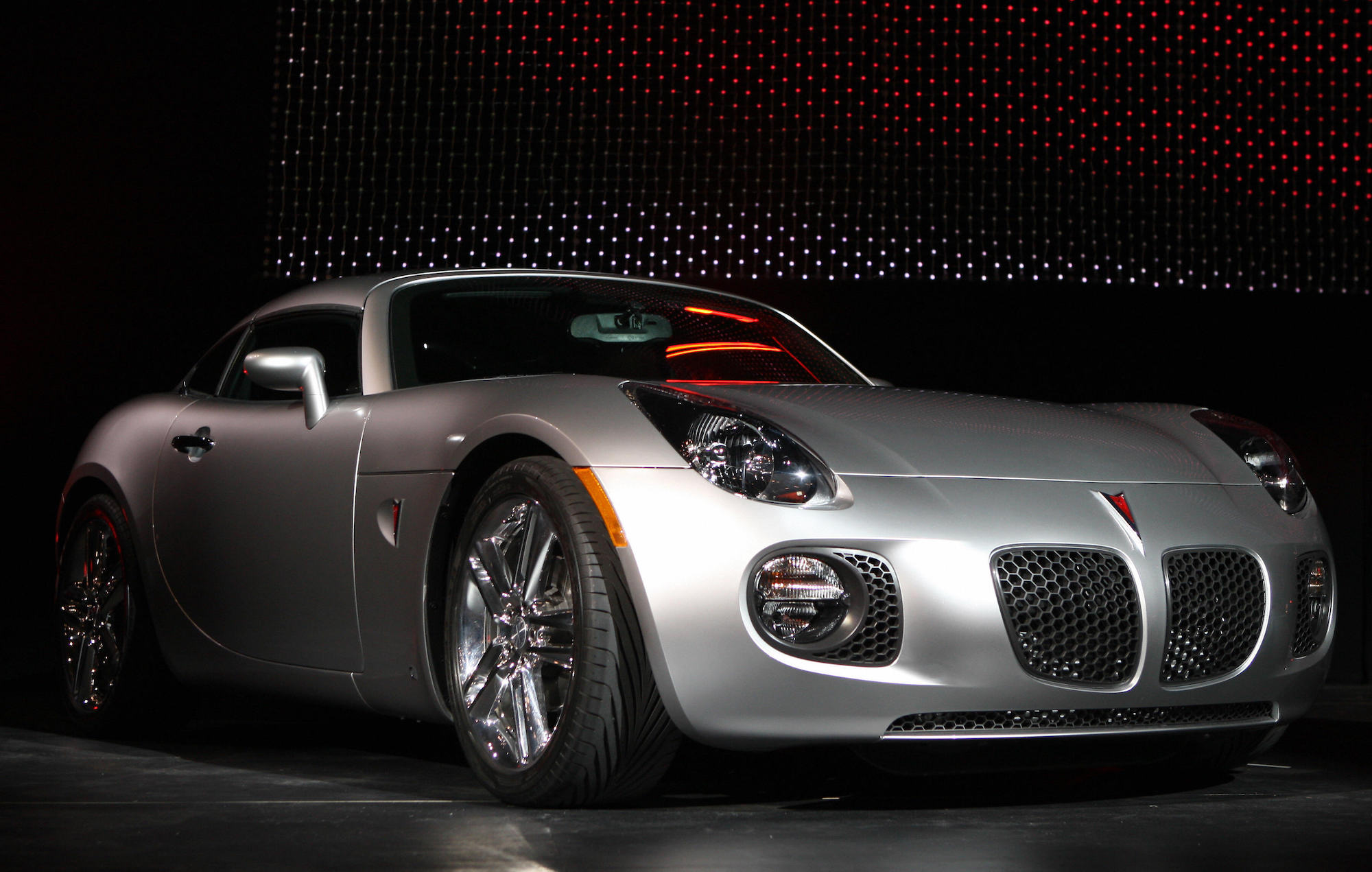 A silver 2009 Pontiac Solstice Coupe is unveiled on March 19, 2008, at the New York International Auto Show.