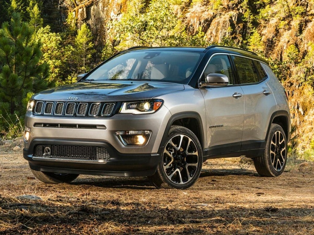 A grey 2018 Jeep Compass off-road.