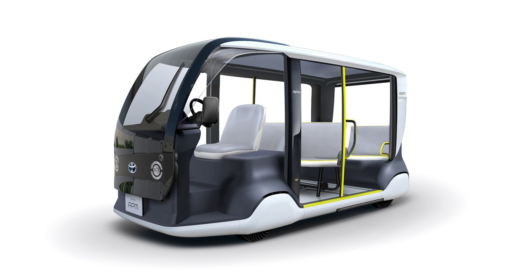 The black and white electric van called the APM, Accessible People Mover by Toyota