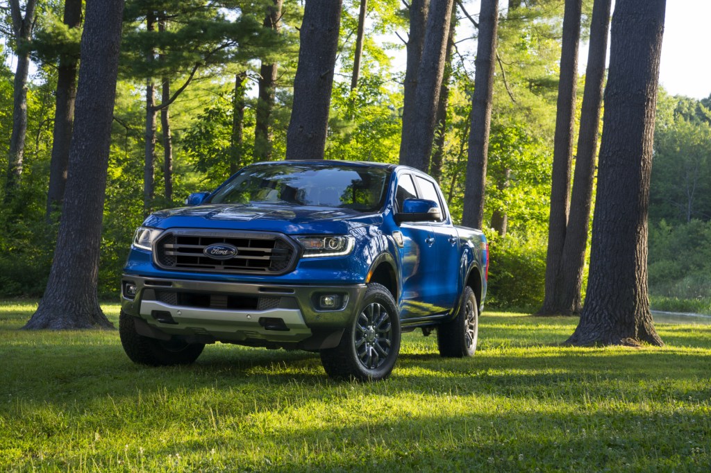 A blue 2020-2021 Ford Ranger parked in the woods