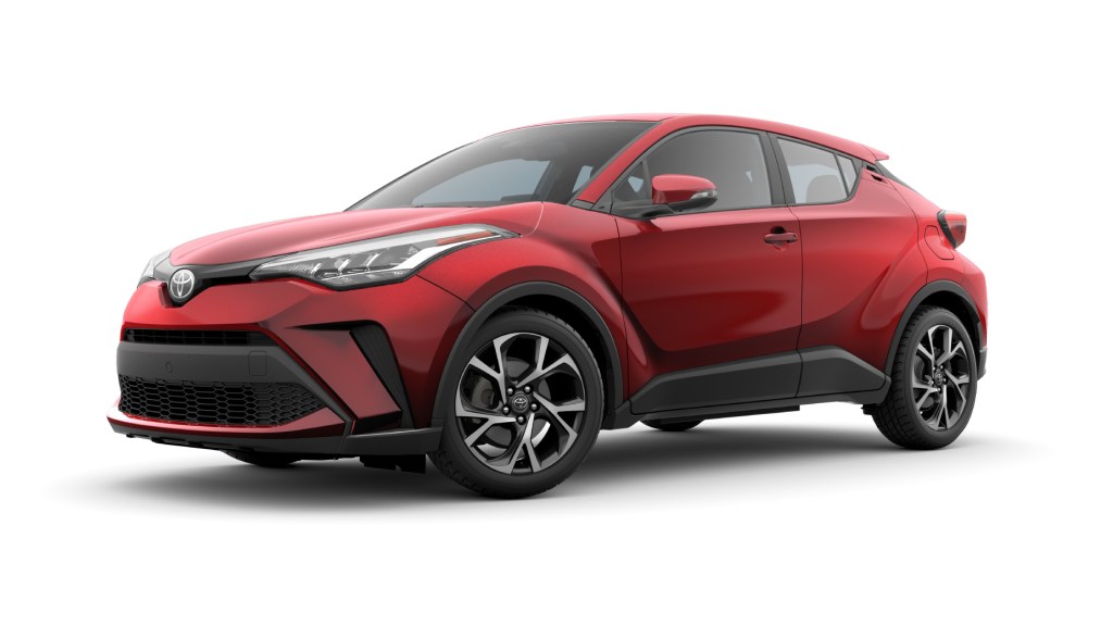 A red 2020 Toyota C-HR in front of a white background