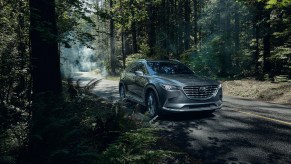 2021 Mazda CX-9 driving through the woods
