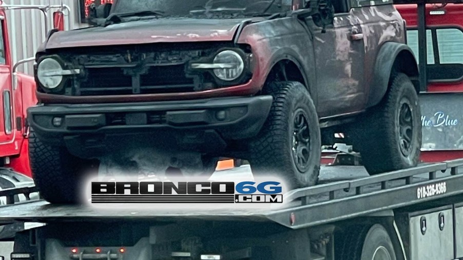 An image of a 2021 Ford Bronco affected by a fire in a transport trailer.