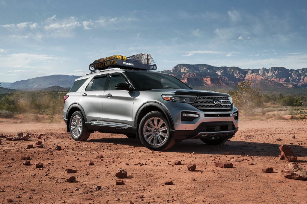 A silver 2021 Ford Explorer with a Yakima roof rack in the desert