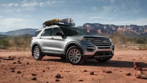 A silver 2021 Ford Explorer with a Yakima roof rack in the desert