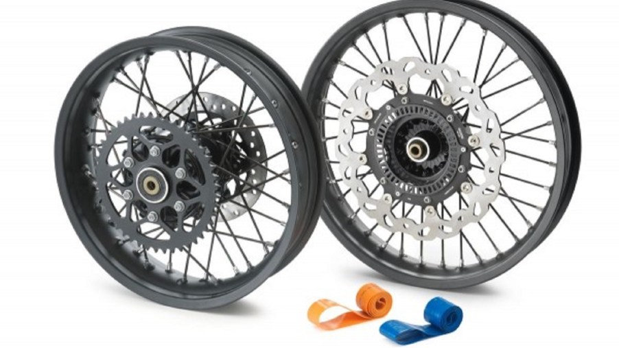 The black 2021 KTM 390 Adventure optional spoked wheels with blue and orange inner tubes
