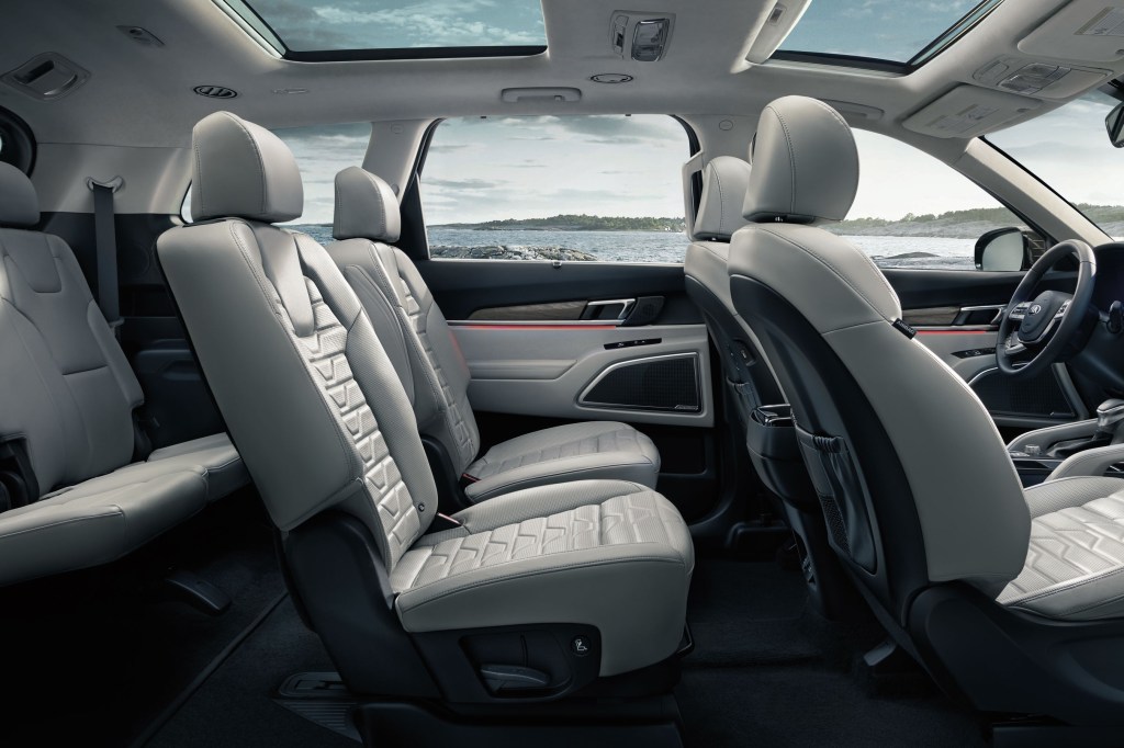 The side view of a white-upholstered 2021 Kia Telluride interior