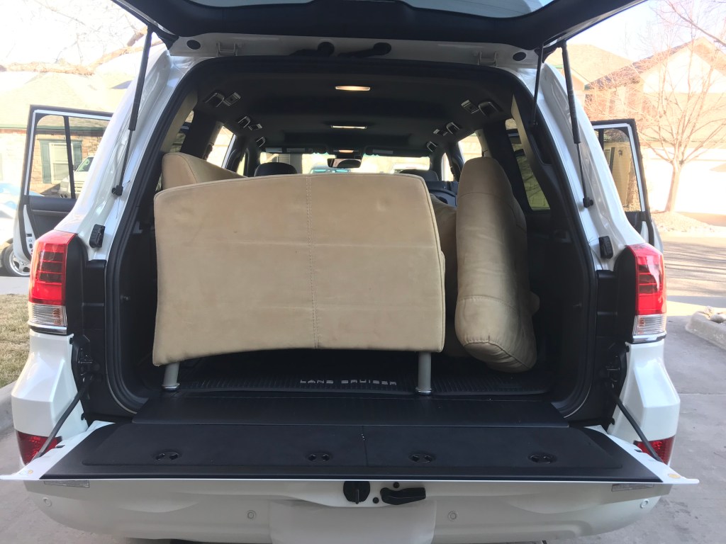 2021 Toyota Land Cruiser with the couch loaded 