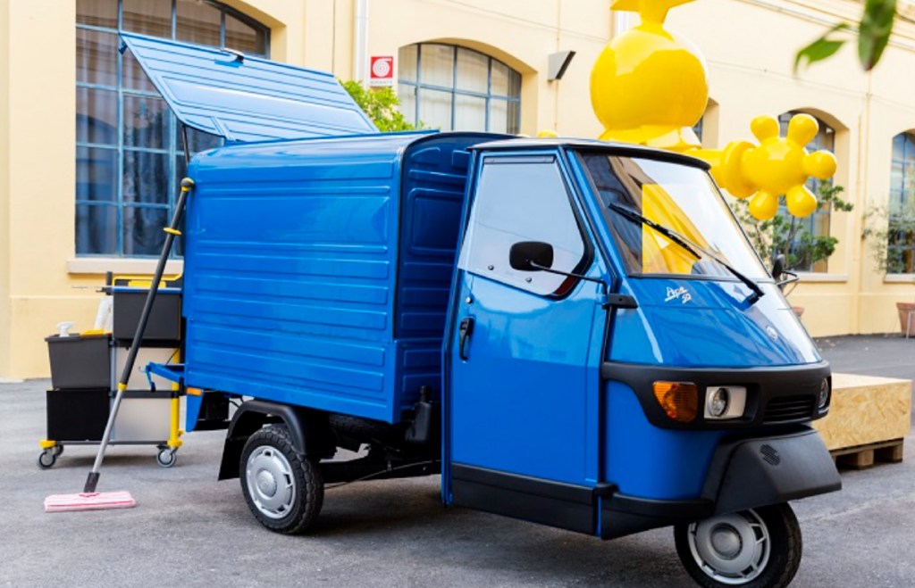A blue 2021 Piaggio Ape 50 Van