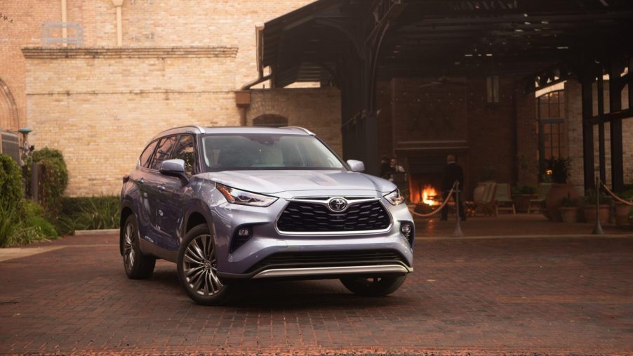 2021 Toyota Highlander parked in a fancy driveway