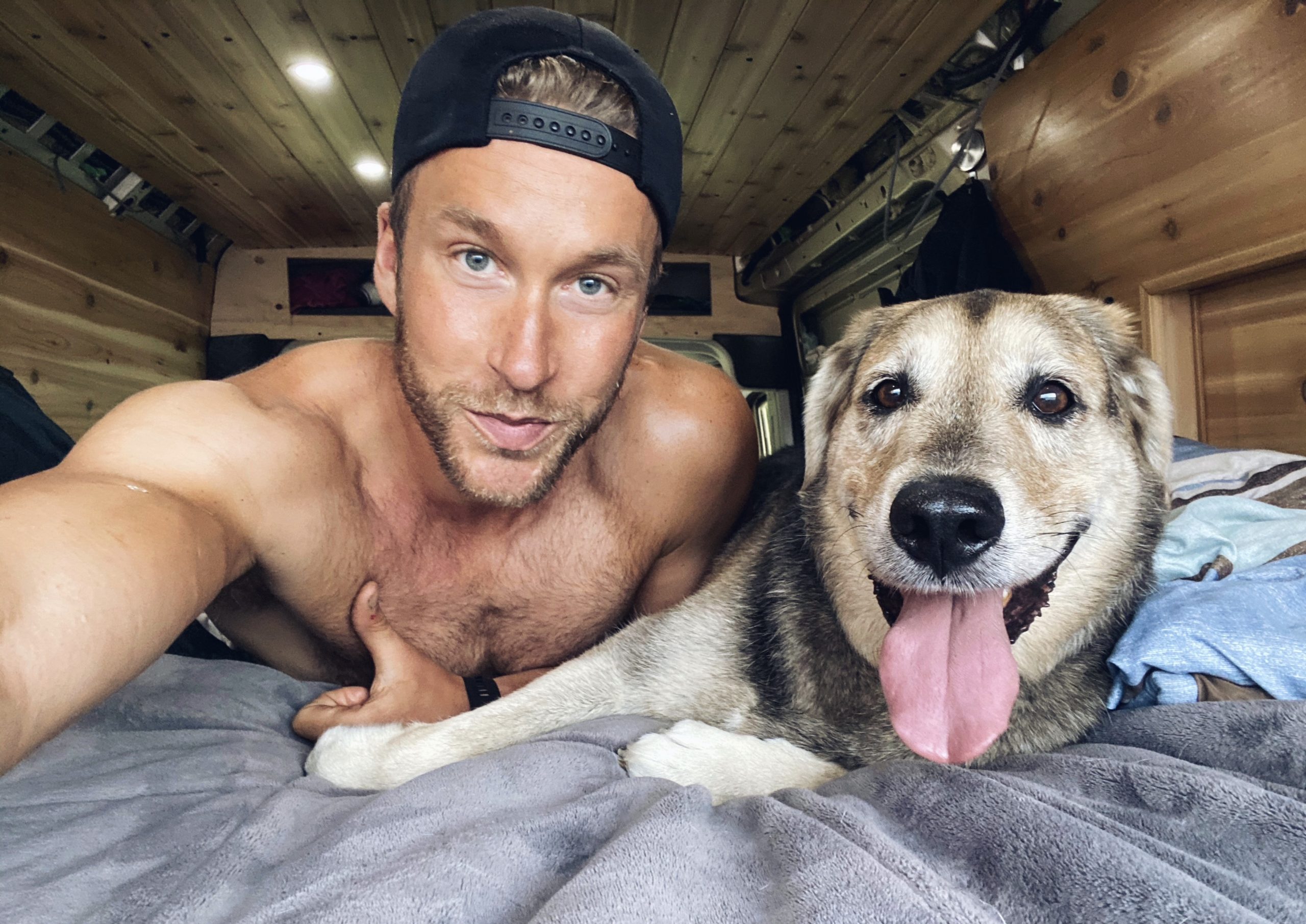 an adorable picture of Dietrich and his bestie bear bear in the 2020 dodge promoter camper van build