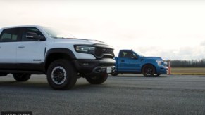 the Shelby F-150 Super Snake vs the Ram 1500 TRX on a straight track in a pickup truck drag race