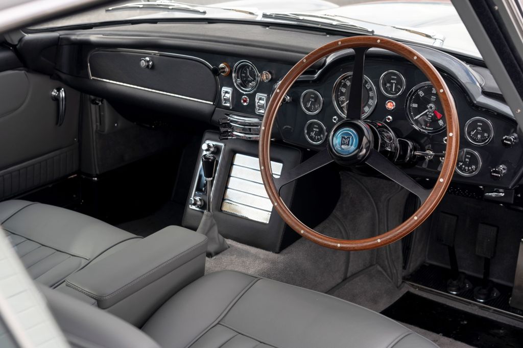 The Aston Martin DB5 Goldfinger Continuation's front seats and dashboard