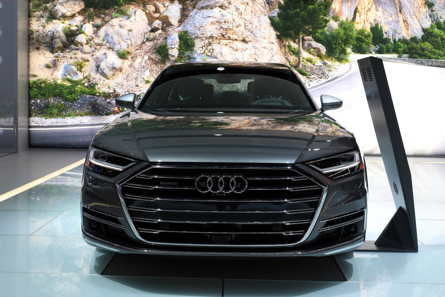 An Audi A8 on display at an auto show