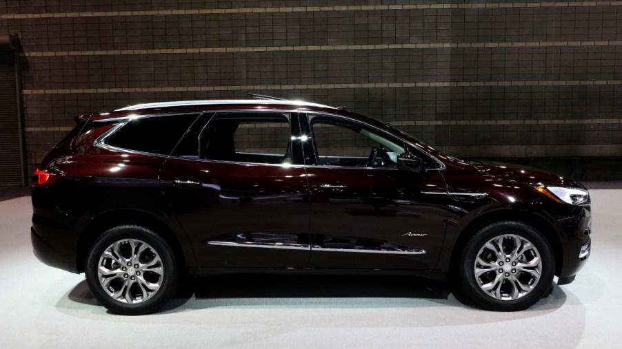A Buick Enclave Avenir on display at an auto show
