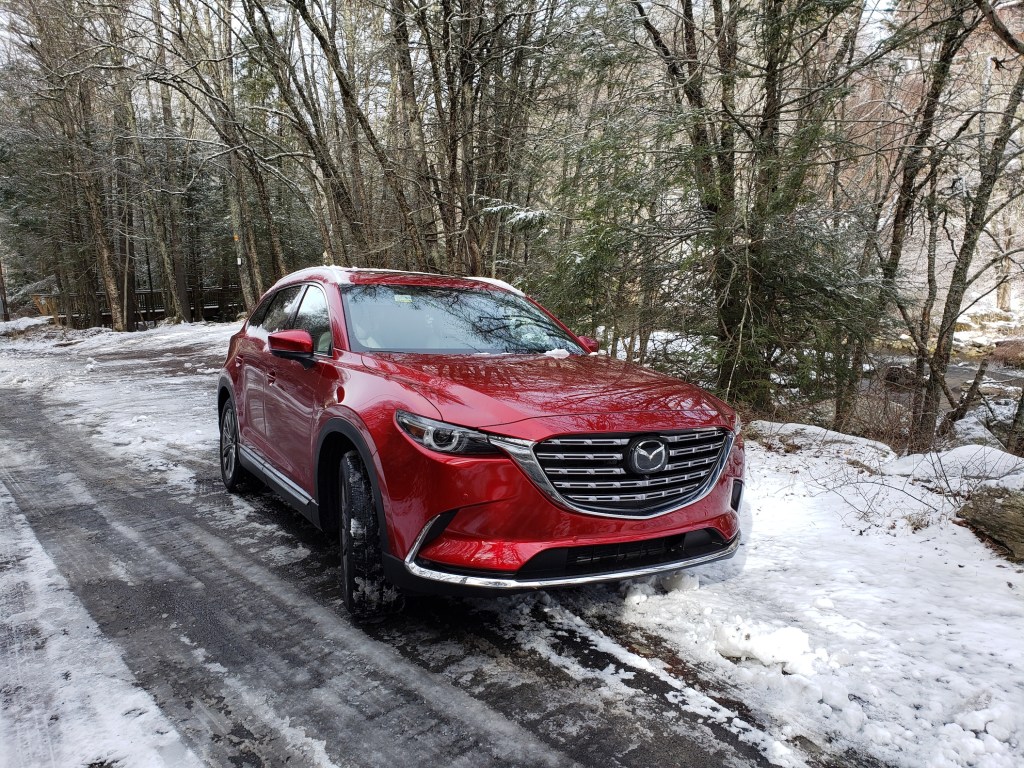 A red 2021 Mazda CX-9 Signature AWD parked in the snow  | Rob Corn