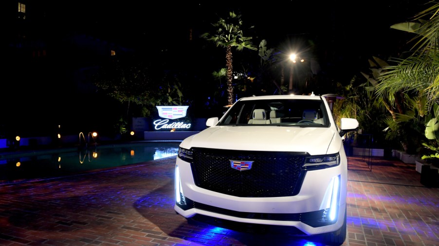 A 2021 Cadillac Escalade on display at night