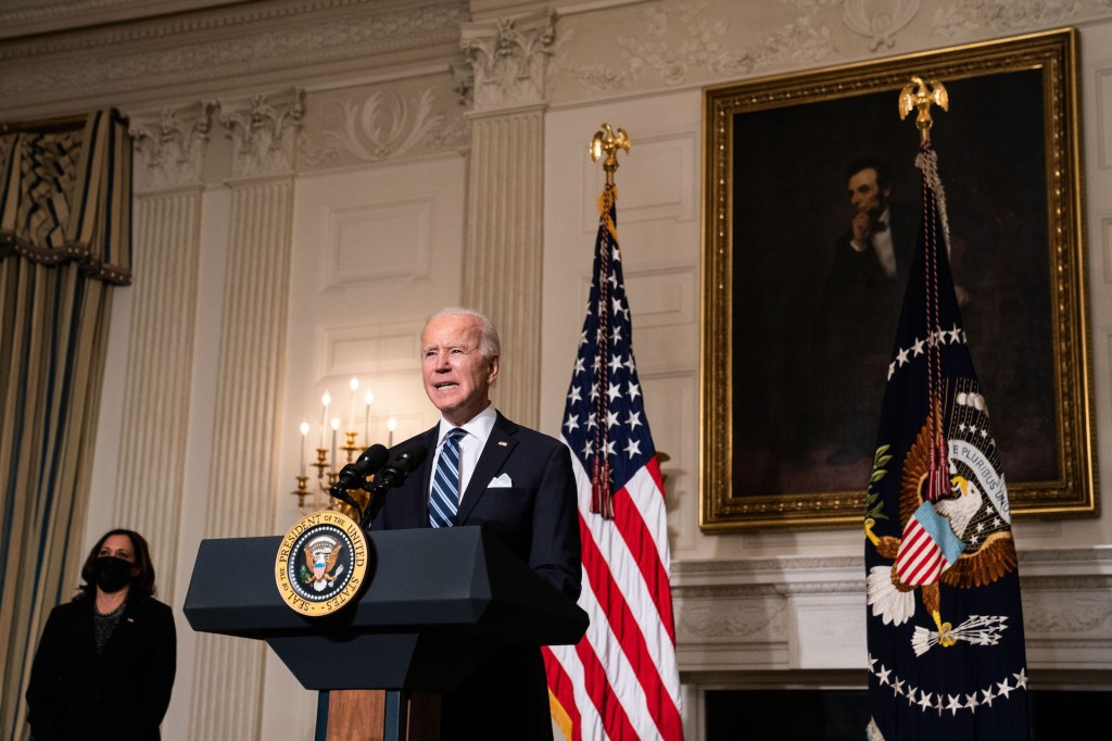 An image of President Joe Biden delivering a speech.