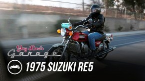Jay Leno on his red 1975 Suzuki RE5