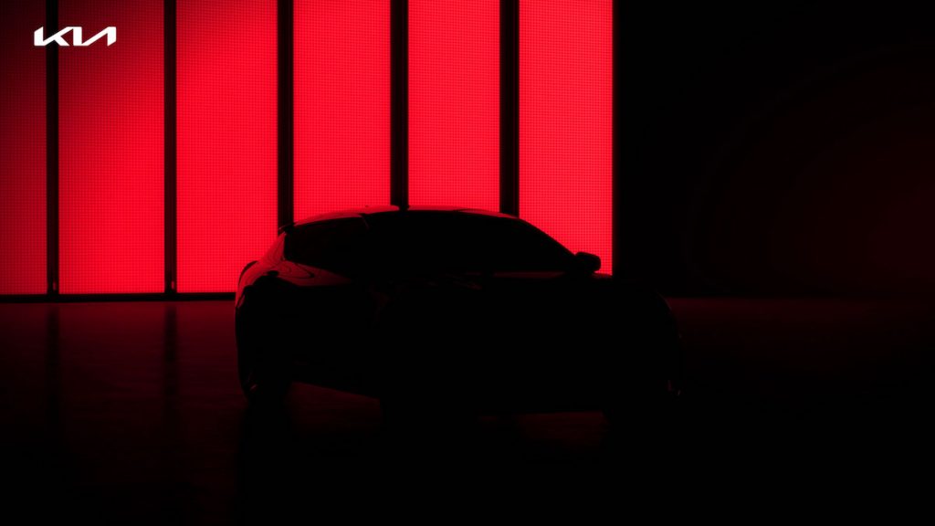 A Kia EV ominously lurks in the shadows with red backlighting