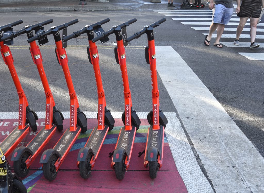 Last-mile scooters stand ready to be rented in Nashville.
