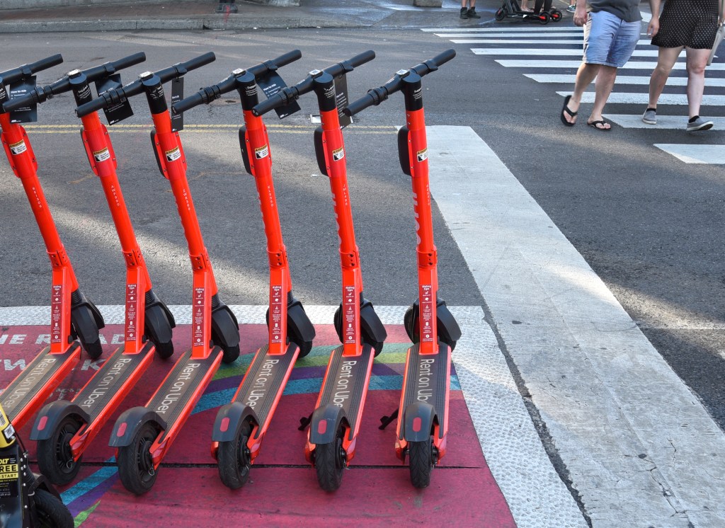 Last-mile scooters stand ready to be rented in Nashville.