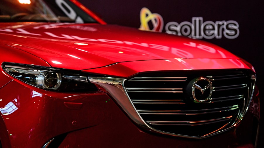 The front end of a Mazda CX-9 on display